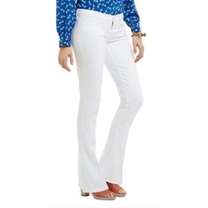 Mother, The Runaway, white mid-rise flare/wide-leg jeans.